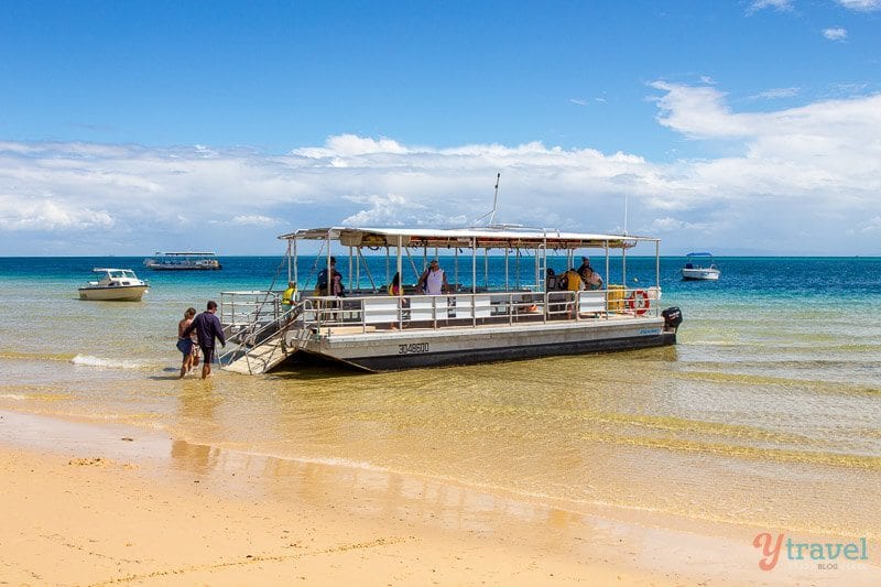 A boat on a beach 