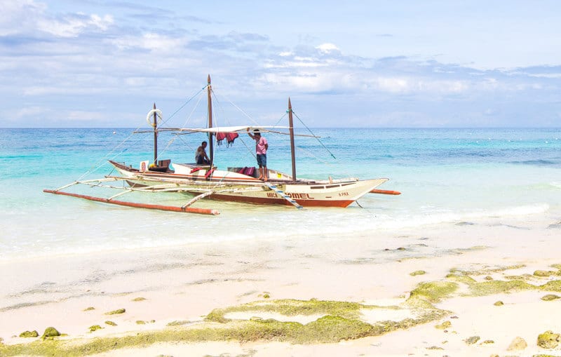 banca boat on shore of Punta Bunga Beach Boracay 