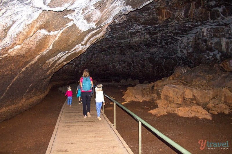 family walking on barodwalk in Undara Lava Tubes 