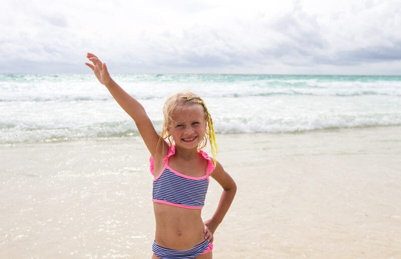 girl standing on the sand