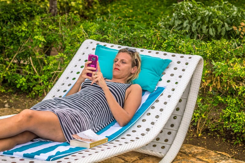 woman sitting in a lounge chair