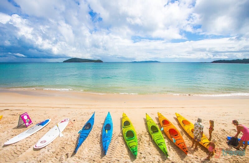 coloured kayaks on beach Great Keppel Island