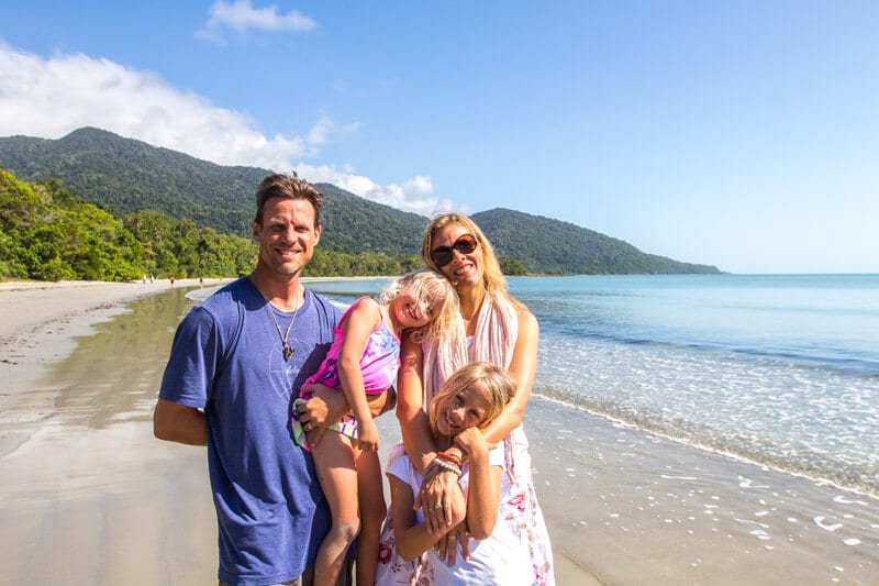 family posing on Cape Tribulation Beach