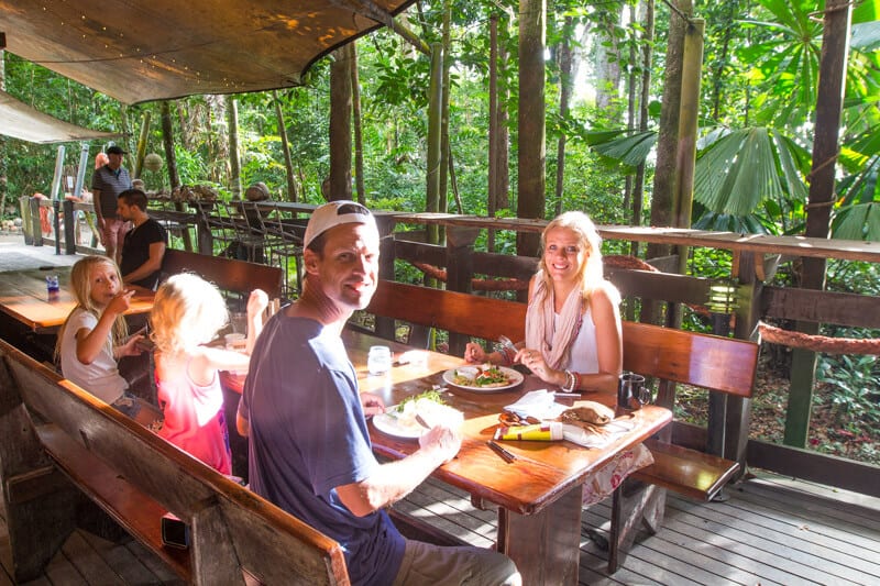 family sitting at Cape Trib Beach House restaurant eating breakfast