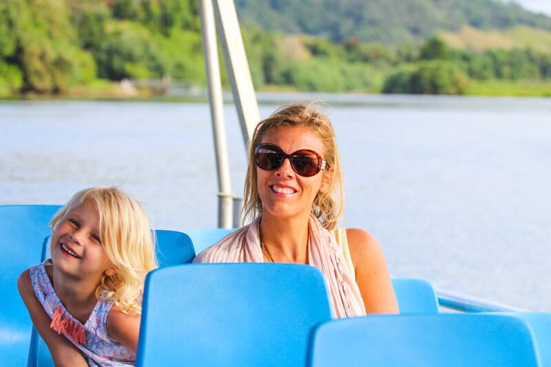 woman and girl on boat