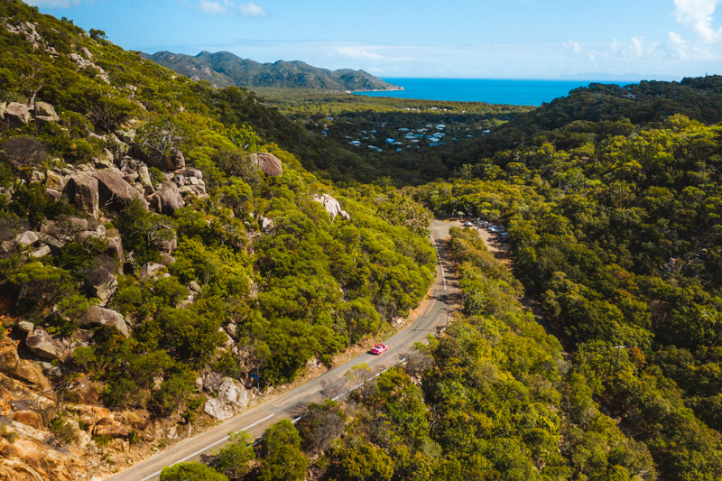 Aerial view of car driving on road