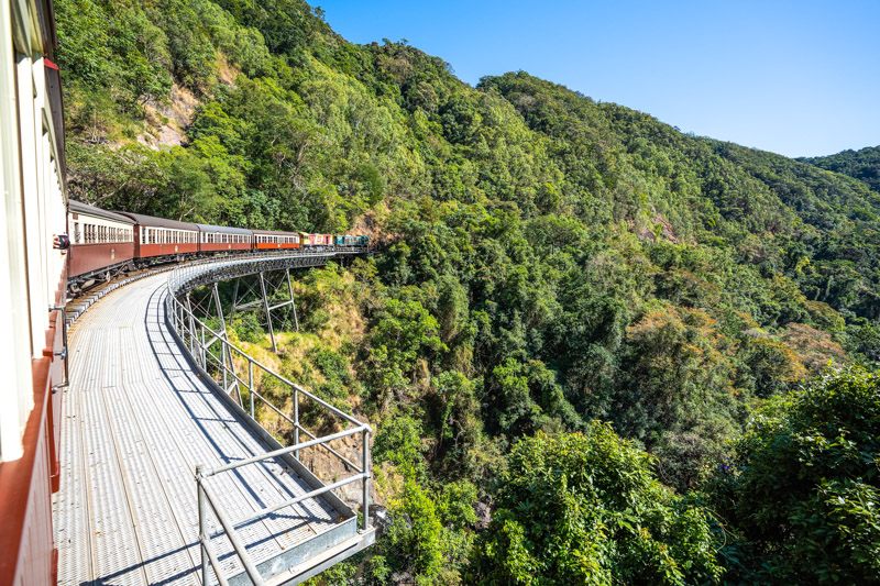 train going around a mountain