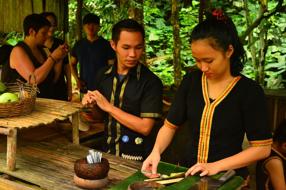 people preparing food on table