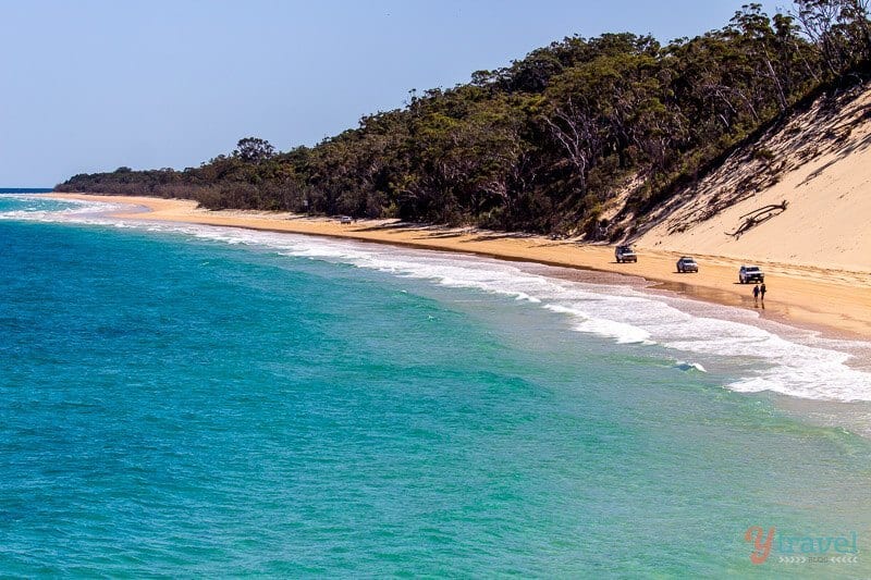 4wd on narrow strip of beach