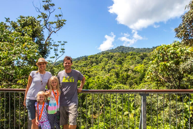 people standing on a lookout