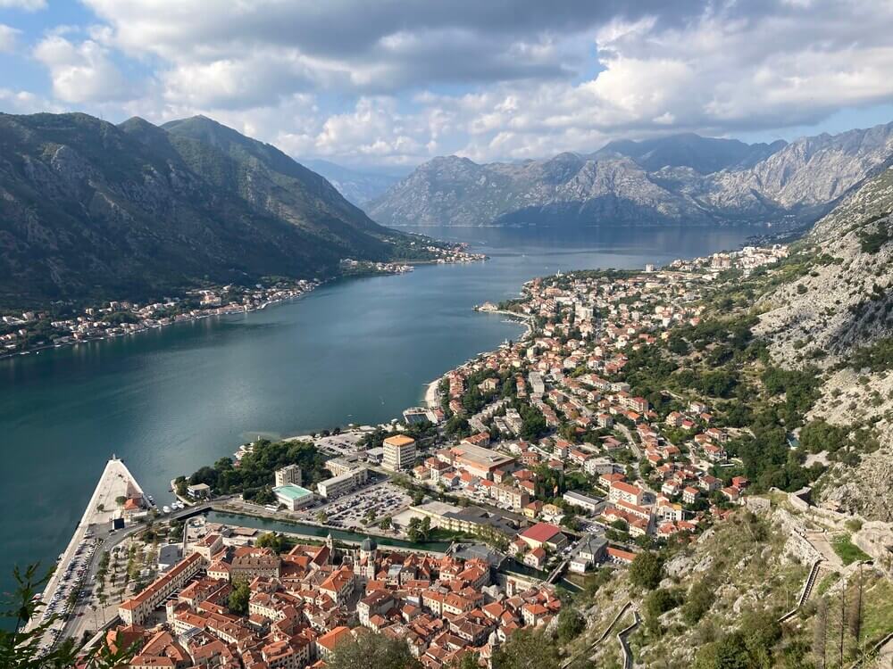 mountains and homes beside the bay