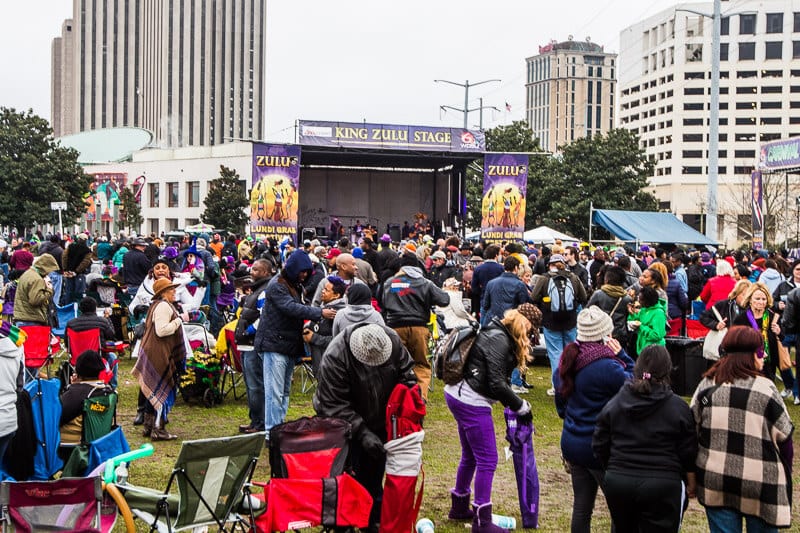 crowds listening to music on stage