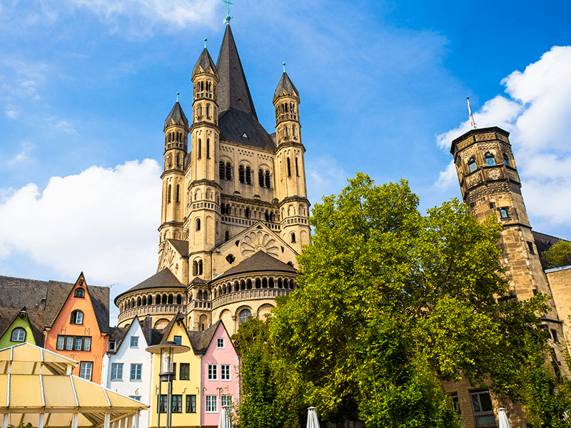 cathedral behind colorful houses