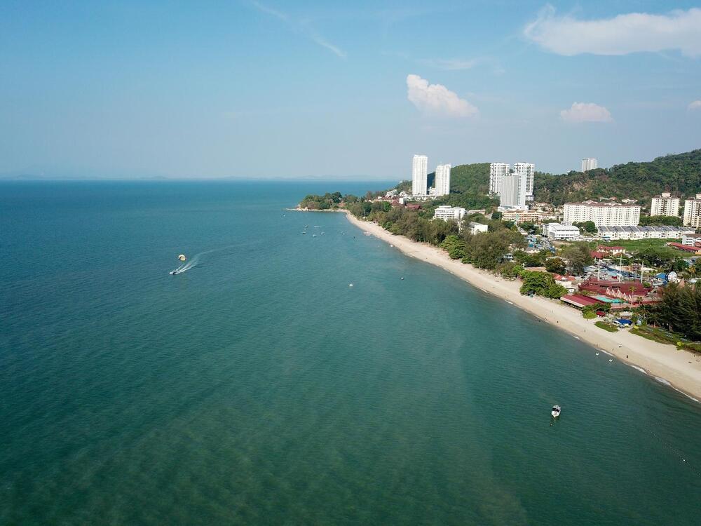 Aerial view beach at Batu Feringghi in blue sunny day