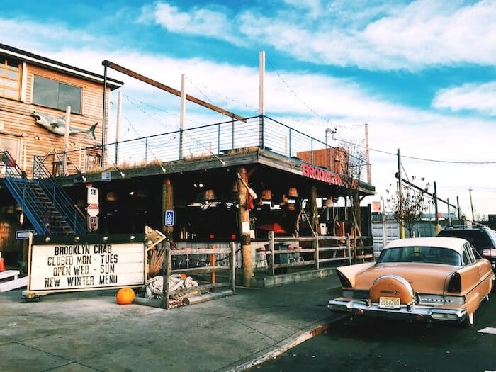 old car in front of Brooklyn Crab 