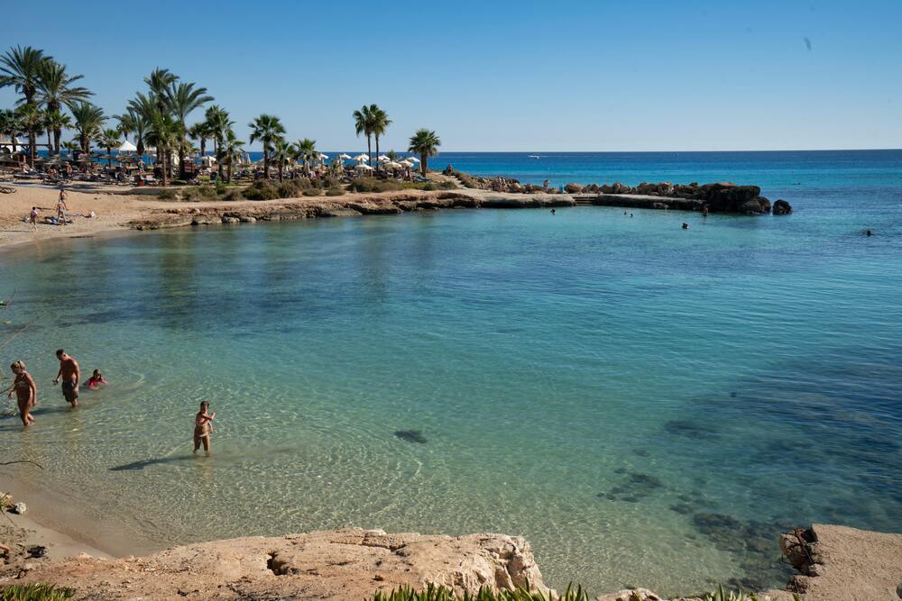 people swimming in Nissi Beach