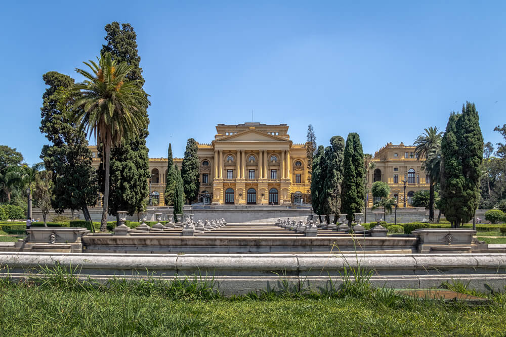 gardens in front of historic yellow casa do grito 