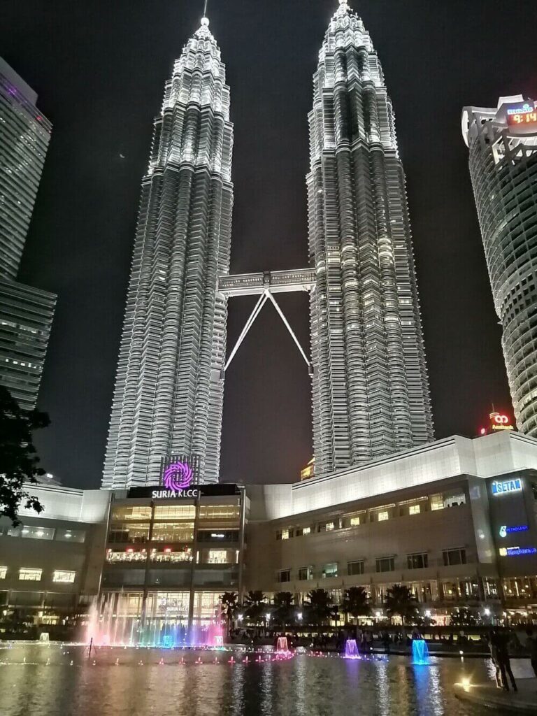 petronas towers lit up at night