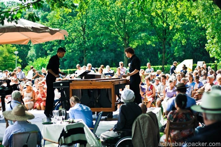 people watching a xylophone performer at the Euromast Park