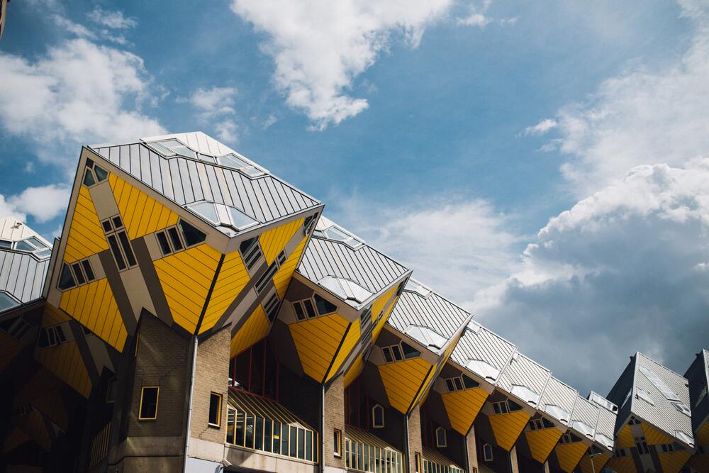 building with yellow cuves on top