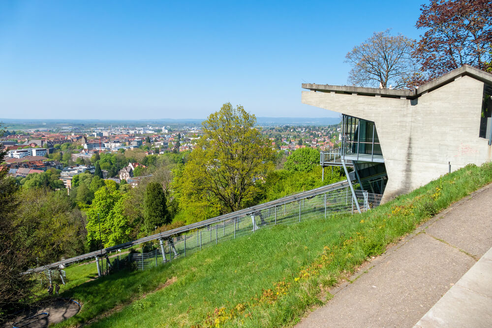 building on hill with view of city