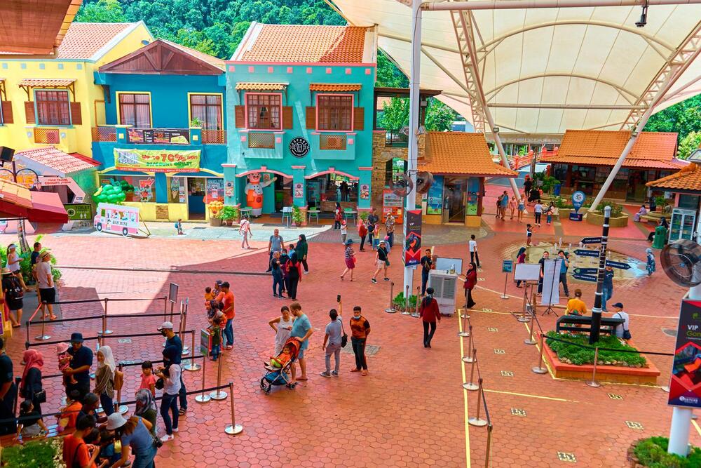 people walking through oriental village on the island of Langkawi.