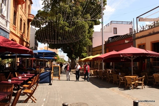 people walking down a street