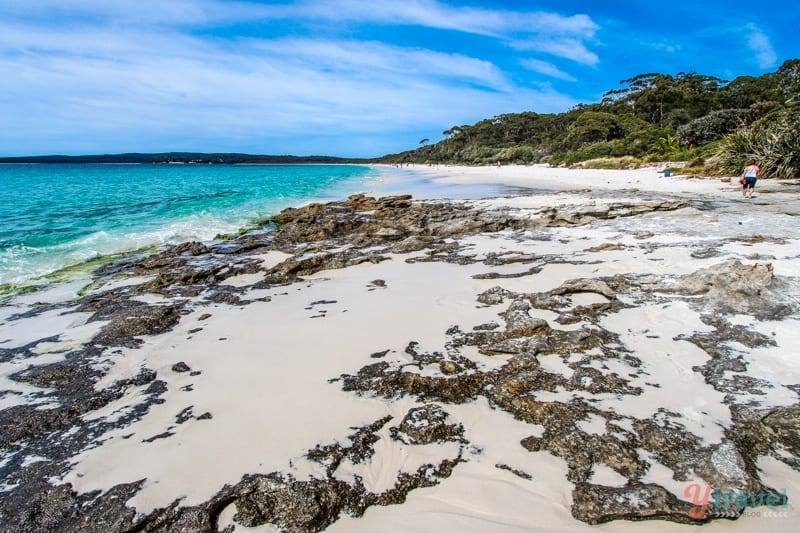 A rocky beach next to the ocean