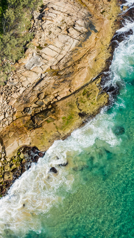 Scenic aerial coastal views over Arakoon National Park,