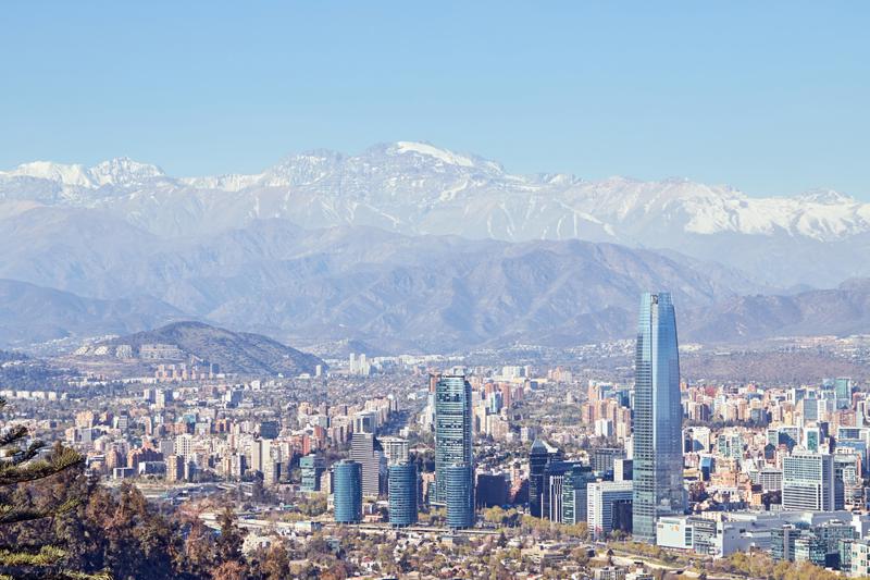 Daytime view of Providencia, Santiago de Chile with Los Andes mountain range in the back. 