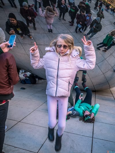 girl jumpin in front of cloud bean