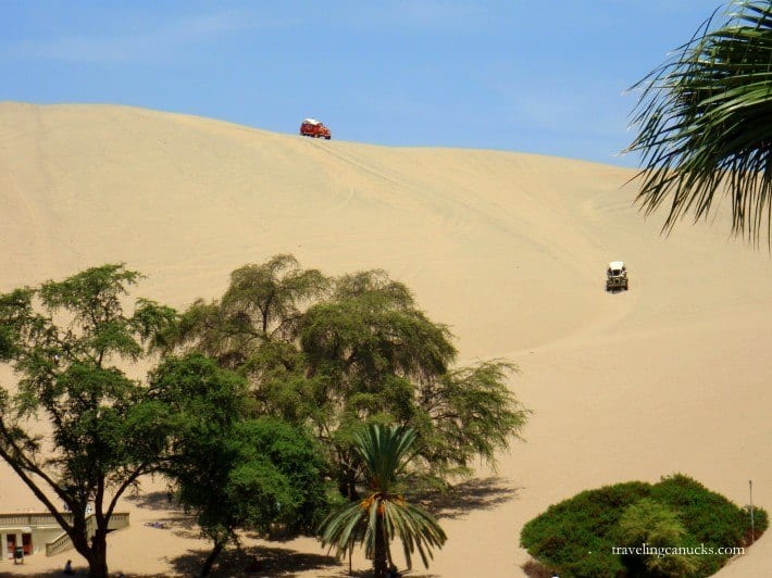 Dune Buggys going down sand dunes