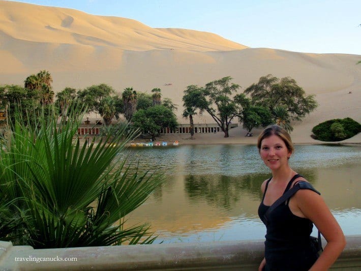 Nicole standing at  oasis at Huacachina Peru