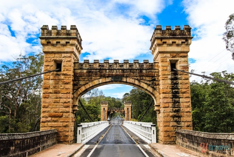 historic stone Hampden Bridge with towers on either end