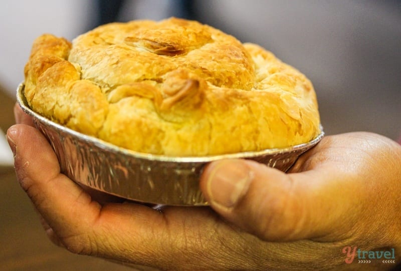 man holding pie