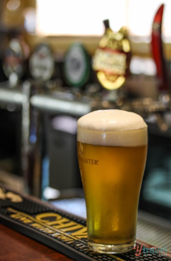 Coopers Pale Ale in pint glass on bar