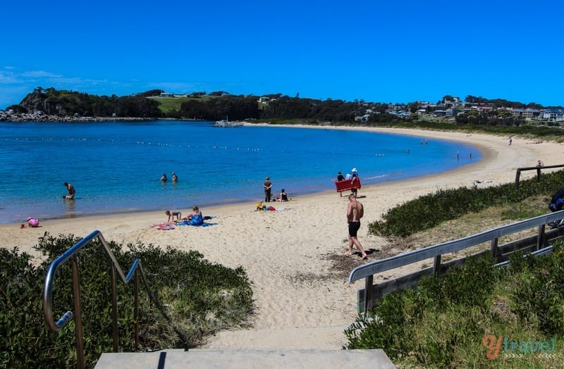 people on Bar Beach, Narooma