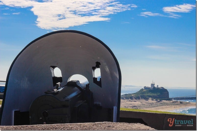 old gun on hill pointed to ocean