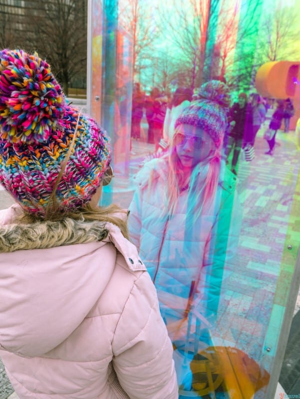 girl posing in Prismatica Art installation Polk Park 