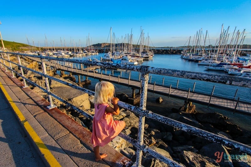 Savannah looking at boats at the Marina