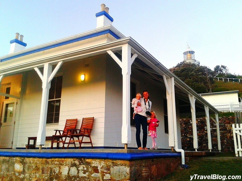 people standing on a front porch