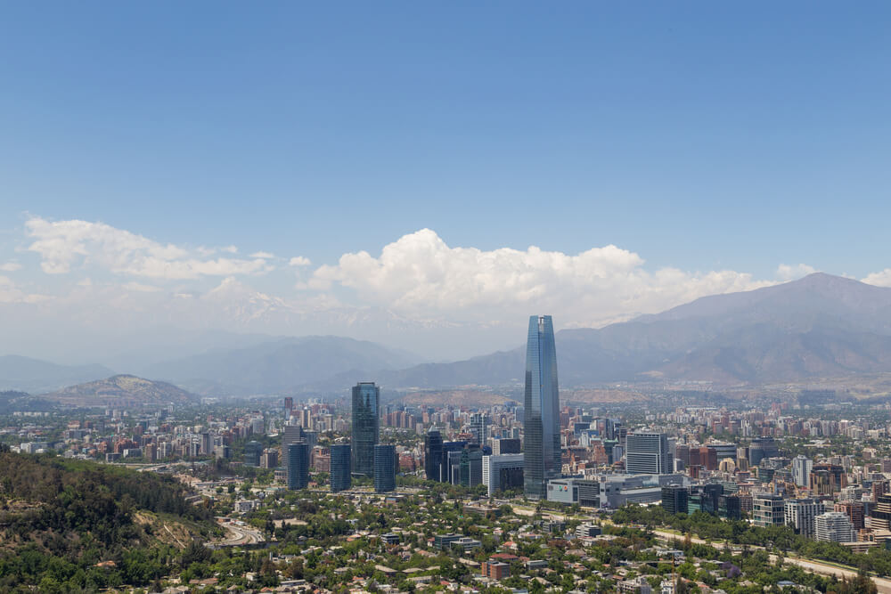 tall buildings rising up from valley floor