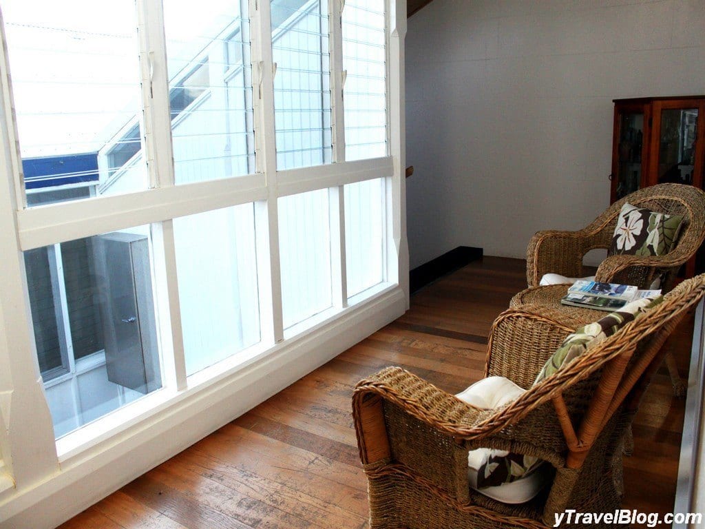 A living room filled with furniture and a window