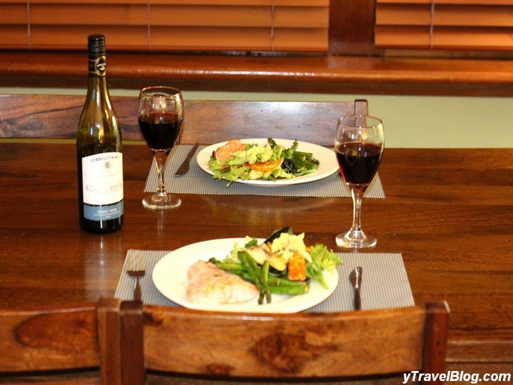 plates of food and wine glasses on a table