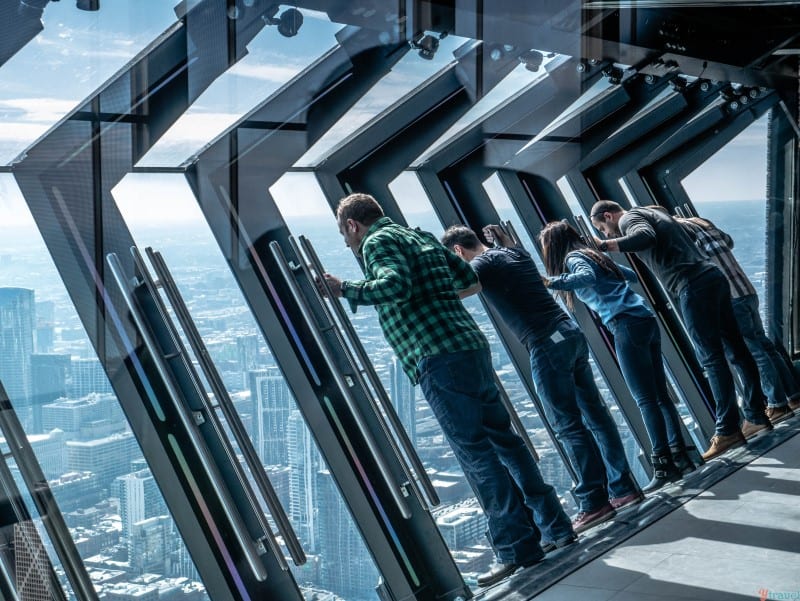 people doing the The Tilt 360 in the John Hancock Chicago