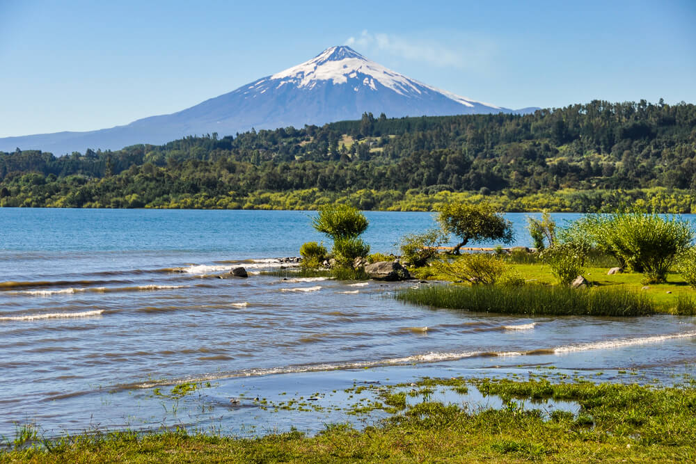 snow capped cillarrica volcano over lake Villarrica