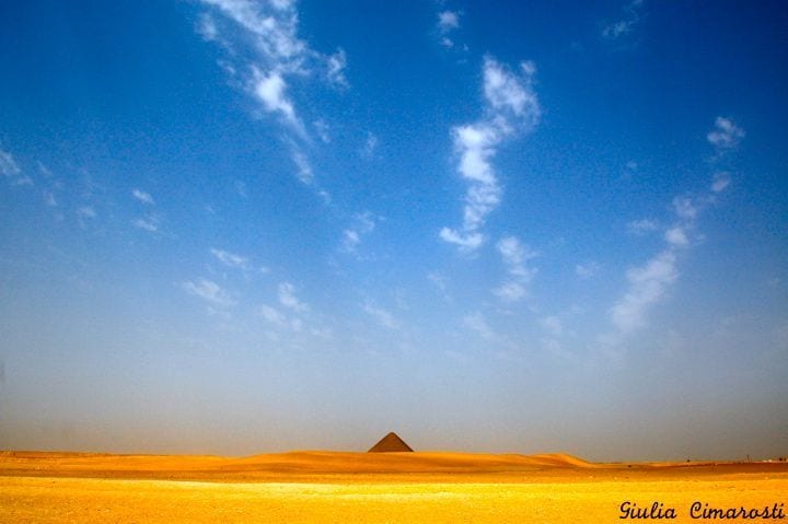 sand dunes and a pyramid