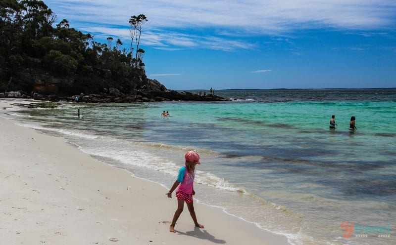 girl playing on beach