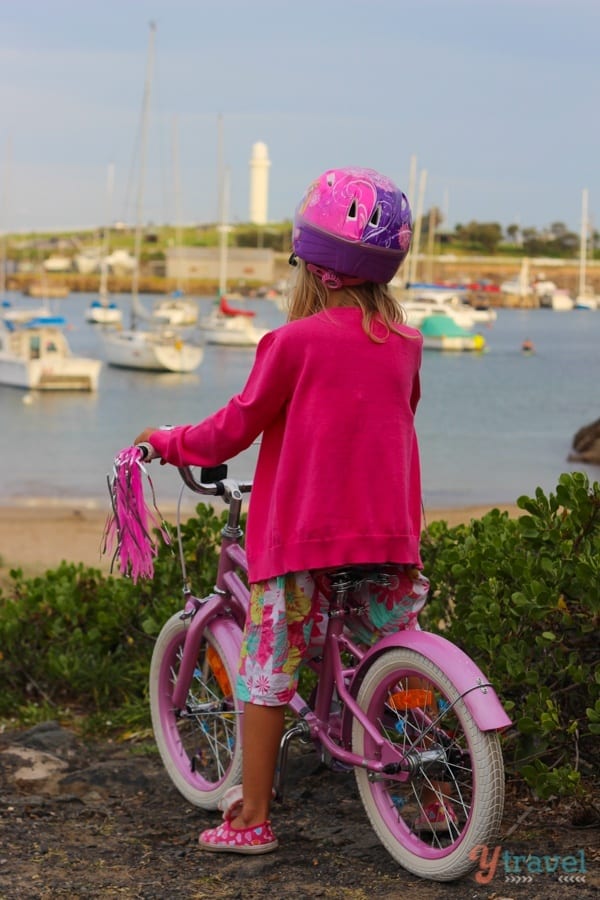 girl on bike looking at view