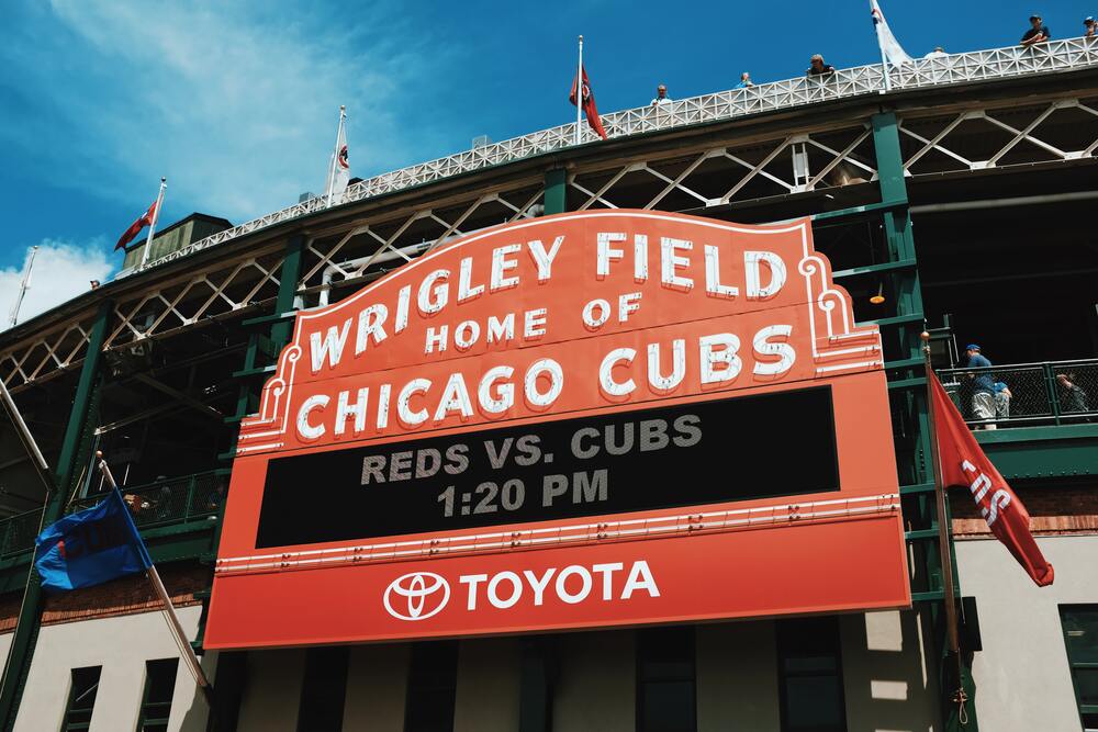 sign wrigley field on outside of field